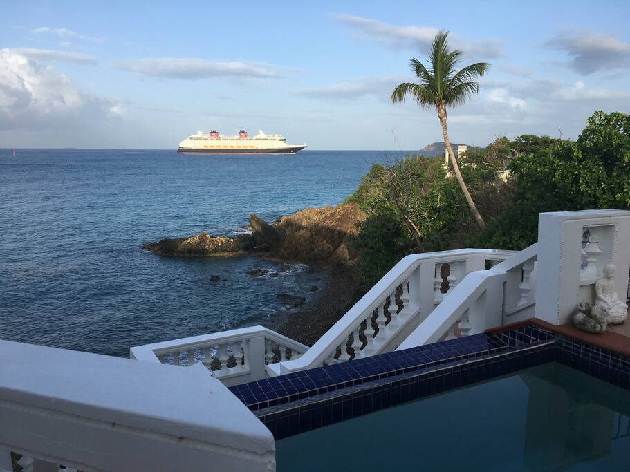 The pool and stairs leading down to private beach