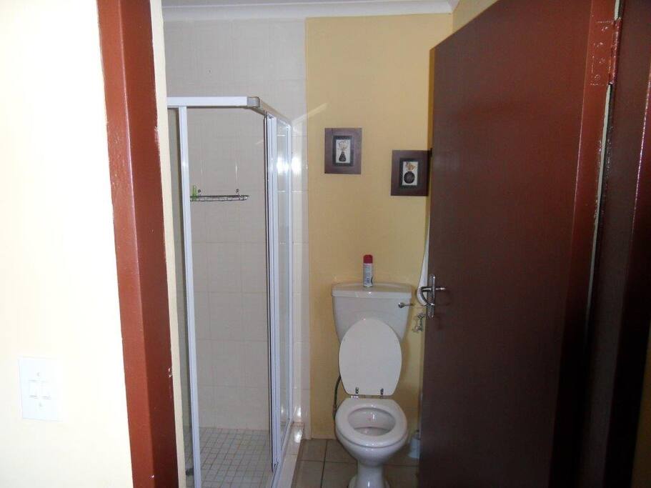 Bathroom with shower & toilet & basin
