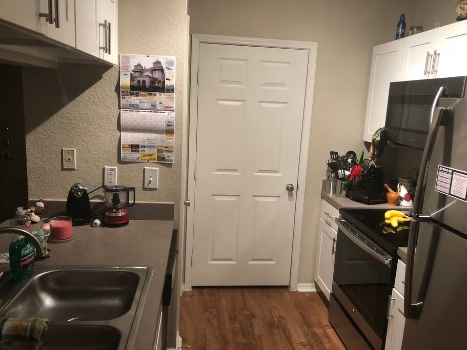Utility closet and pantry closet Garbage Disposal