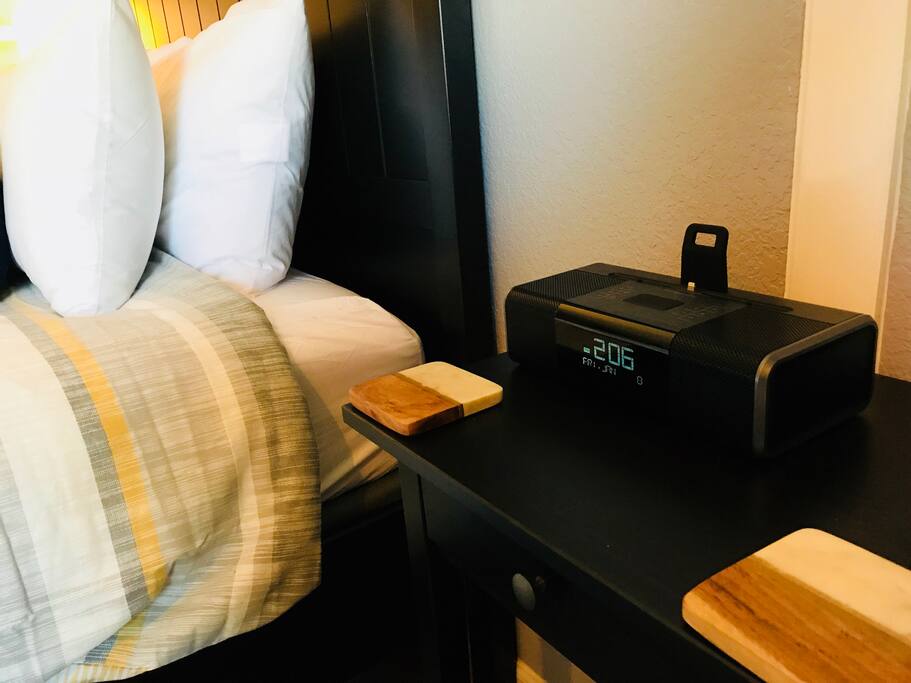 Alarm clock / radio with iPhone charger.