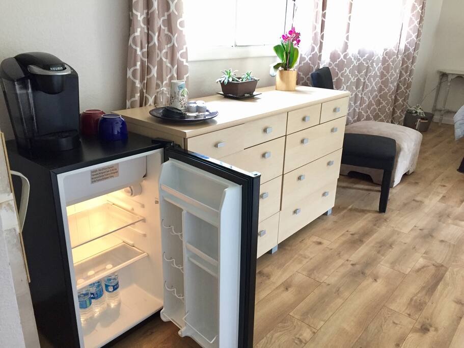 Keurig Coffee maker, coffee pods, mugs and creamer provided. Mini fridge and small freezer available as kitchen is inaccessible.