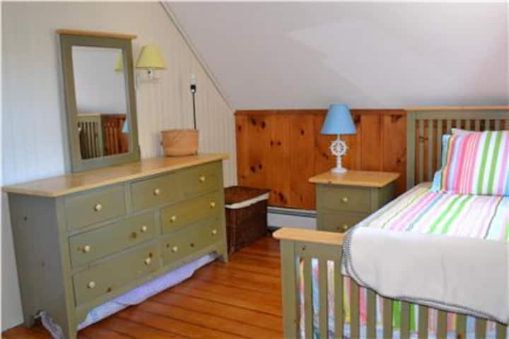 Second Bedroom contains 3 twin-size beds (one is a trundle) plus dresser.   If desired, 2 twins can be used together to make a King-size bed 
