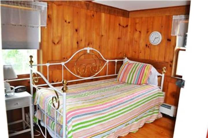 First Bedroom (on first floor) contains a twin bed plus a desk.