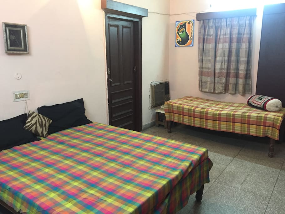 Bedroom 1: which comprises of AC, 3 single beds