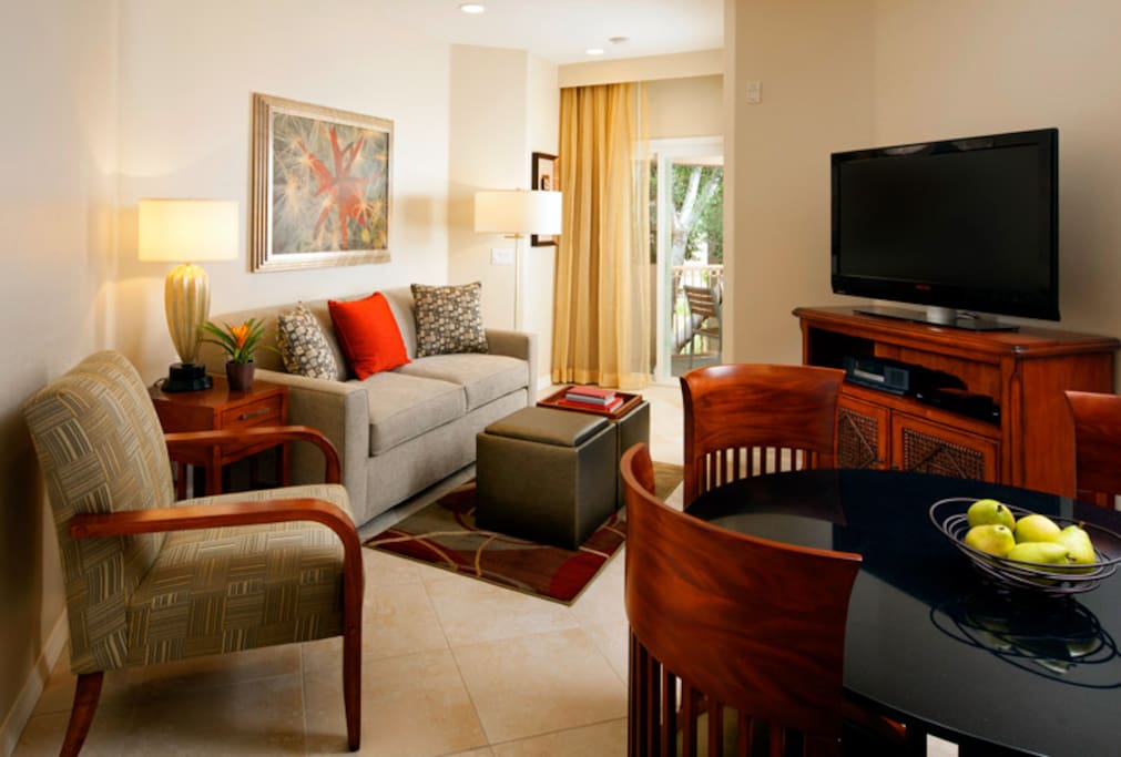 Cozy living room with balcony or patio access
