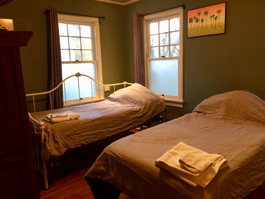 The two beds are separate, but also join together to make one big bed.