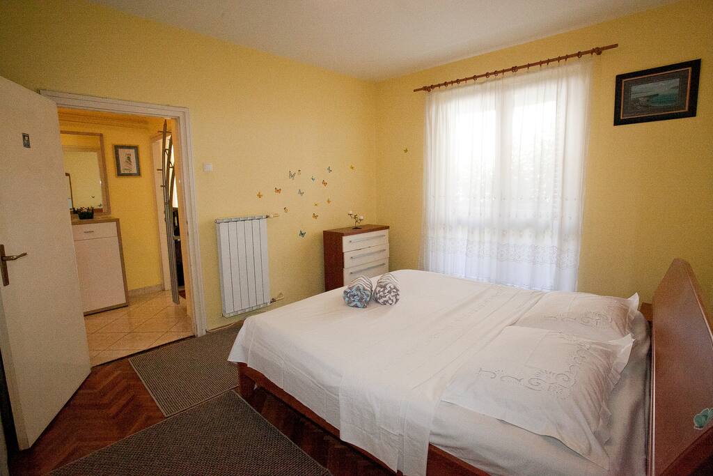 Spacious and bright bedroom.