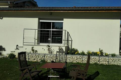 Air-conditioned house with garden.