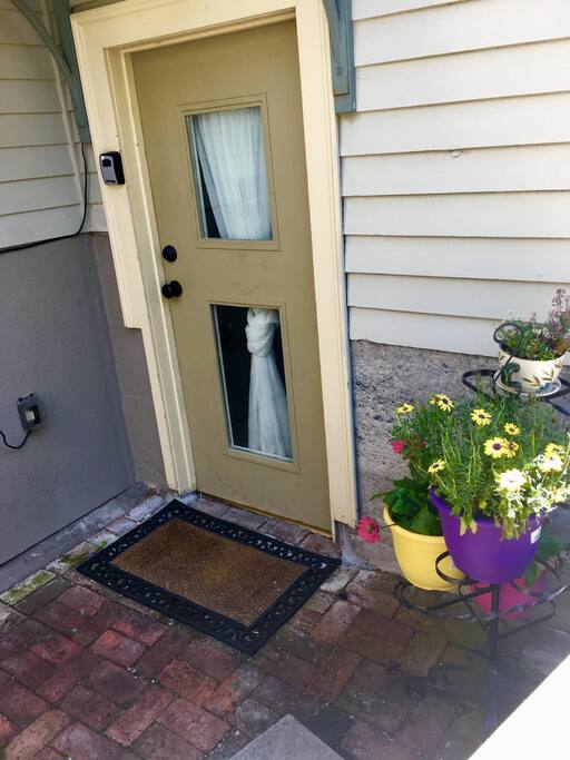 Door to apartment entrance at back of home
