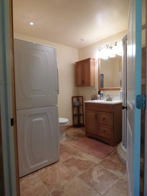 Full bath with washer and dryer