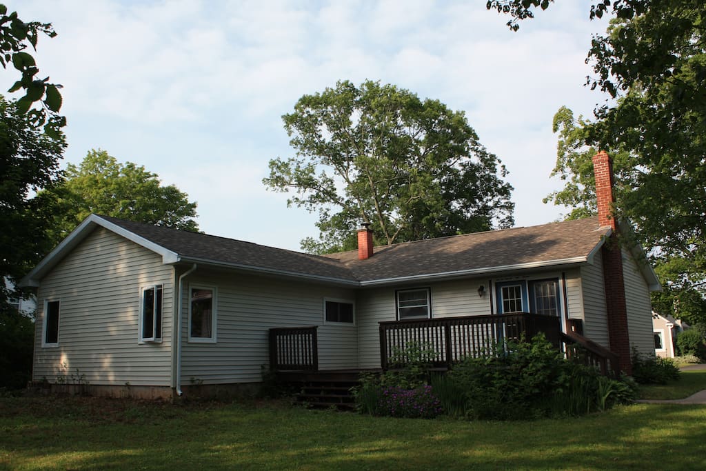 Large private backyard with deck - master bedroom shown to the left.