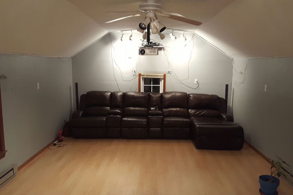 sofa chairs in movie theater room