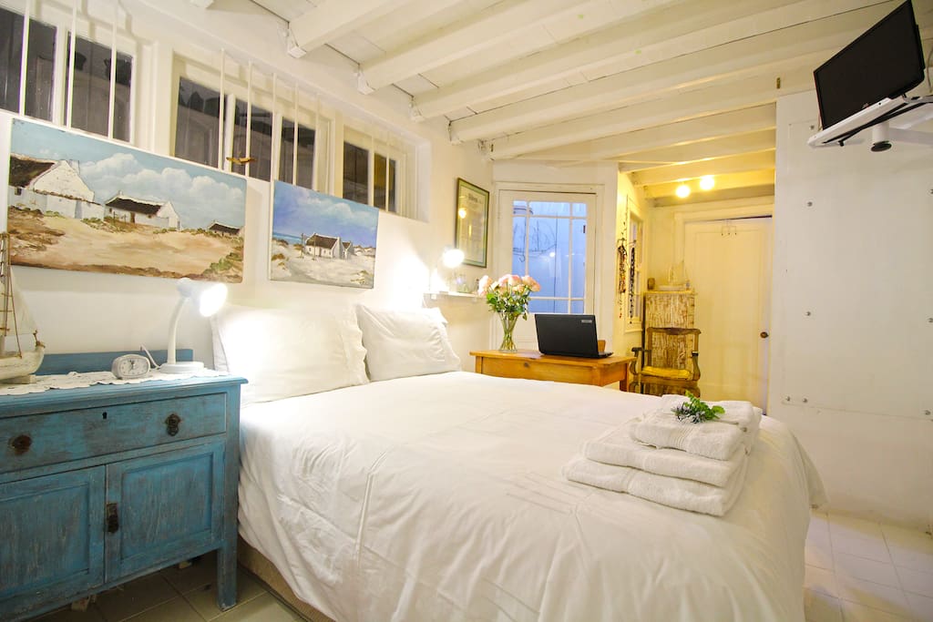 Downstairs bedroom off the living area, with en suite bathroom