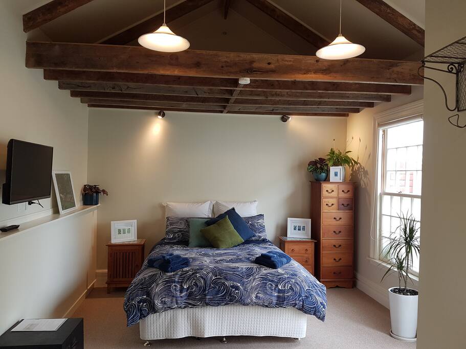 Inside the cottage with super comfy Queen bed and soft and firm pillow mix