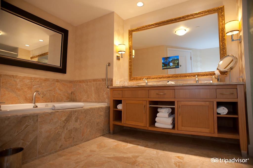 The bathroom (sorry, no more TV in the mirror)...but the tub is HUGE!