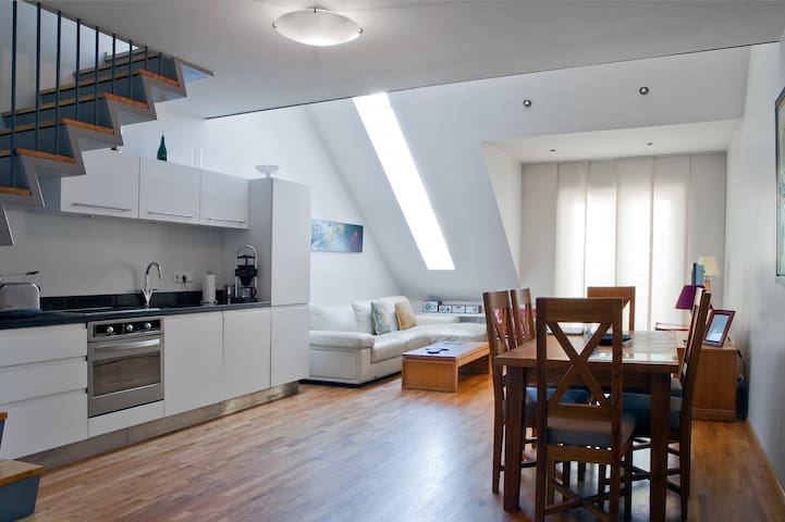 Fab penthouse downtown with private hot tub.