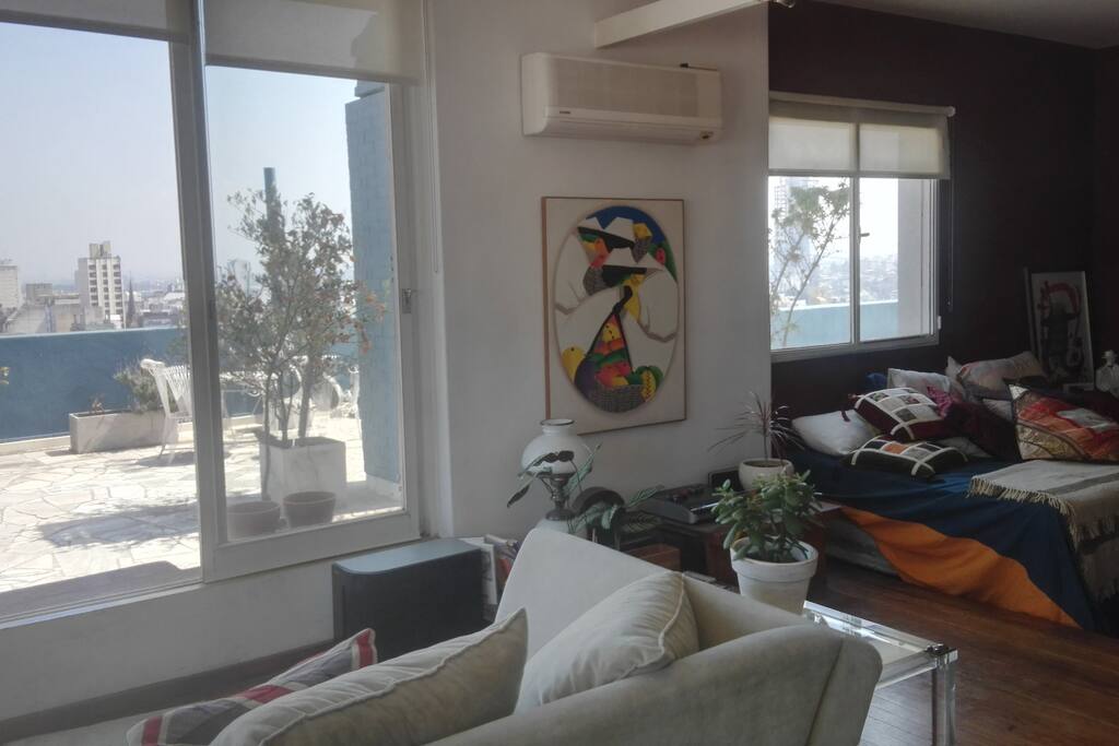 Cama con acceso al Living