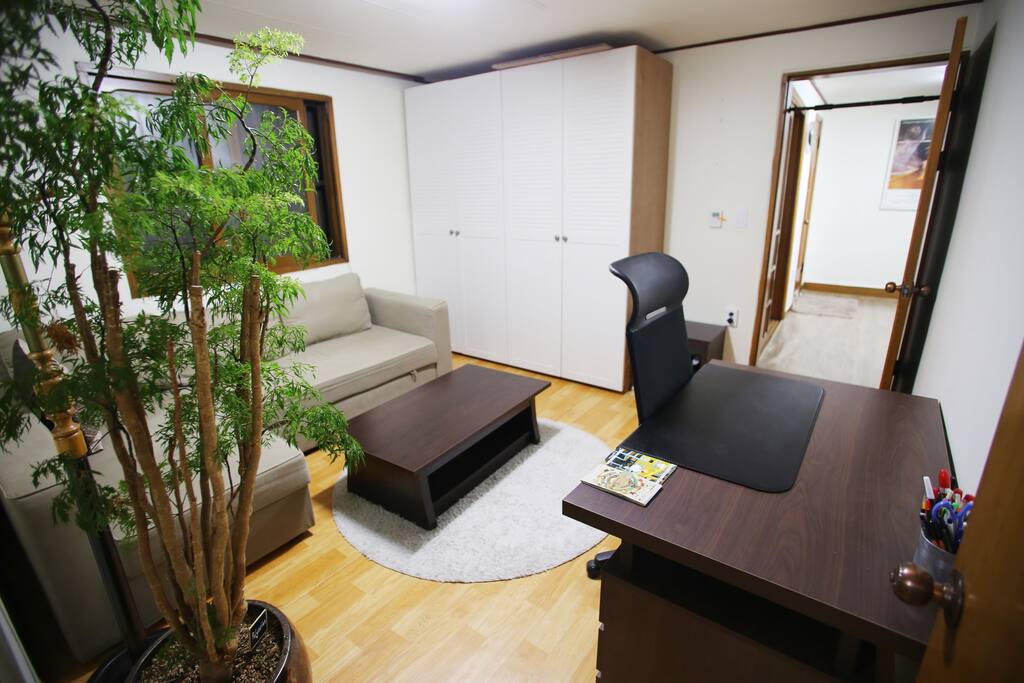 The living room offers plenty of room to work, socialize or have some quiet time.