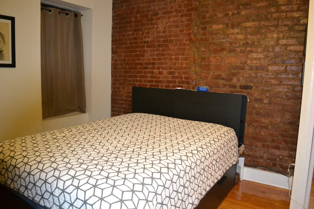 Bed in the bedroom.
