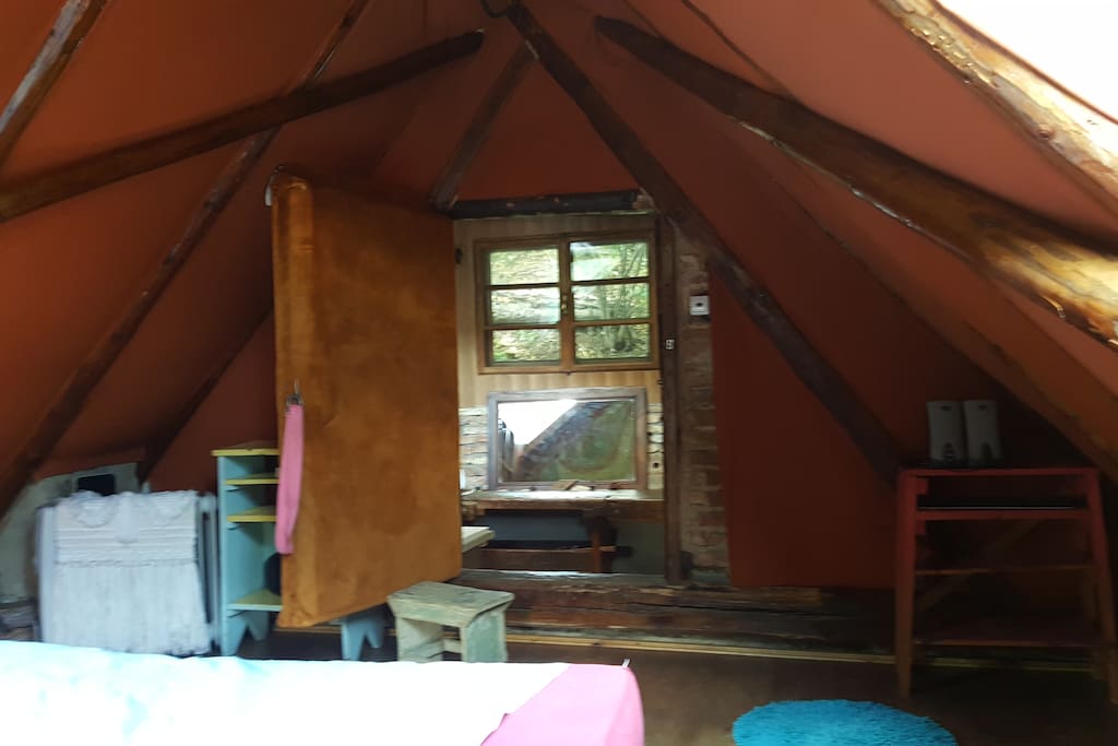 View from laying in your handmade Queensize bed.No, it's not an indian teepee nor a mongol yurt, it's just a cozy place we handcrafted for special people, like us and yoo :))