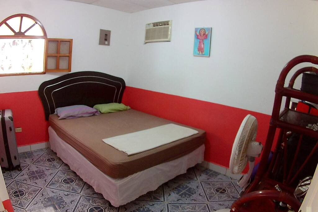 Spacious double bedroom with air conditioning