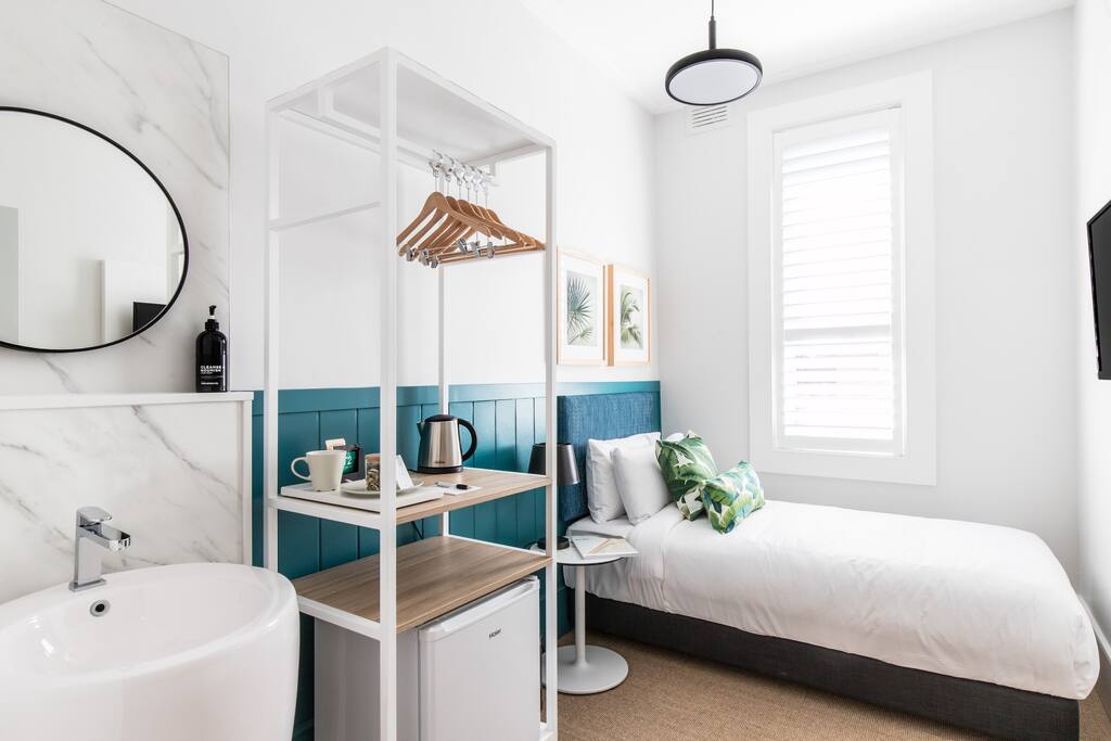 Single rooms are fitted with private wash basin and TwoGoodCo luxury amenity.