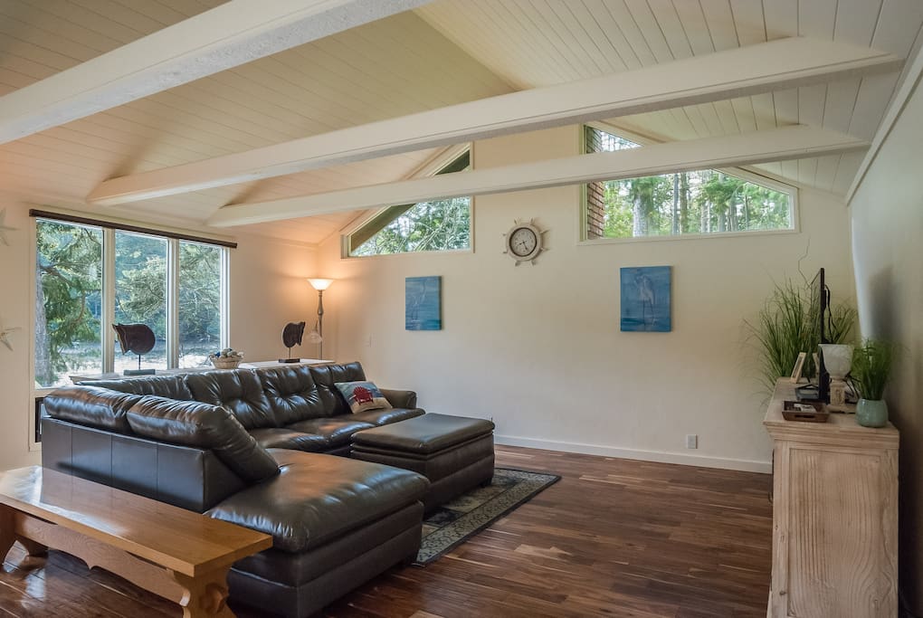 Living Room with comfortable sectional sofa and ottaman