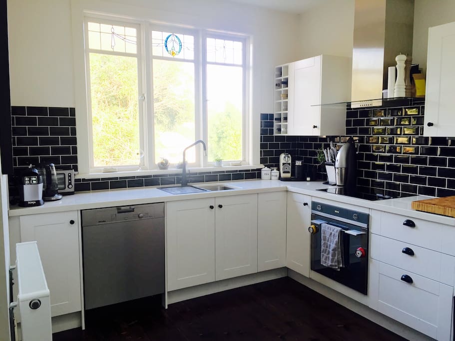Our gorgeous kitchen with dishwasher and nespresso machine.