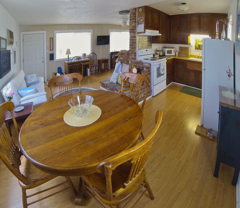 The cabin features a full kitchen and dining area, wifi and television. There is also a desk for those who need a place for their laptop computer.
