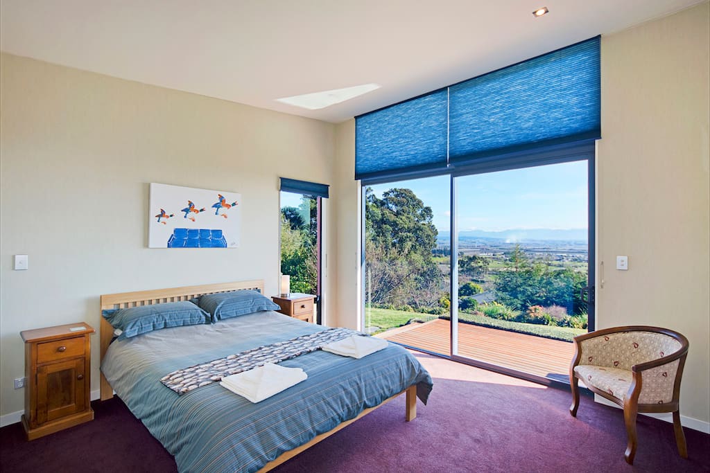 Bedroom 1 with view to mountains and ocean