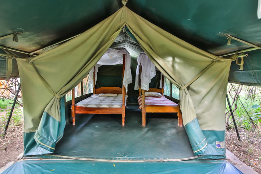Tent variation #2 with two twin beds // cozy tent with beautiful view to Talek river