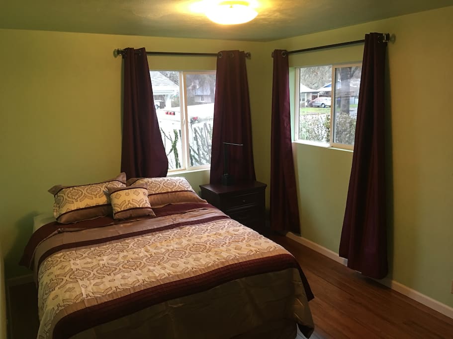 Queen bed with eastern light
