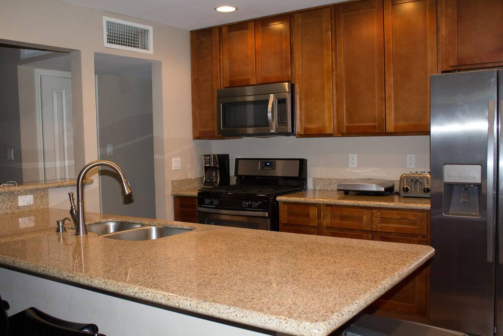 Shared kitchen with specified fridge and cabinet space