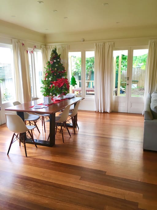 The kitchen/dining area comfortably seats 6 adults with lots of natural light