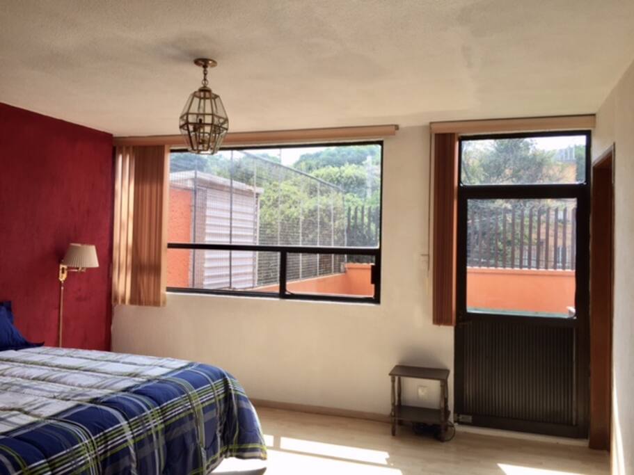 Recamara con vista a la terraza
