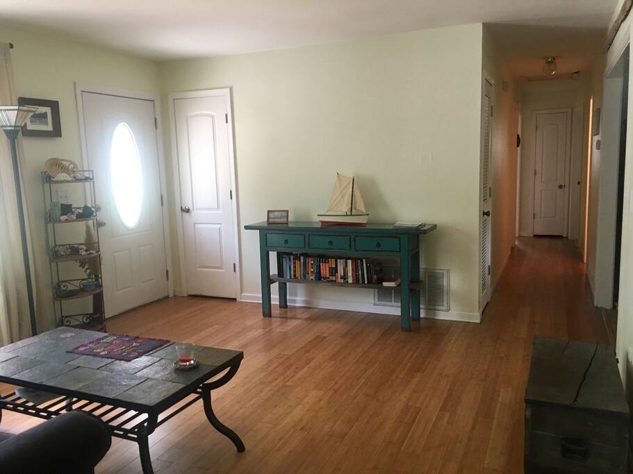 View of entryway into the home and hall to bedroom/bath.