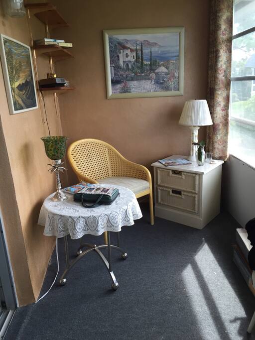 Enclosed lanai for your morning coffee and a desk for computer.