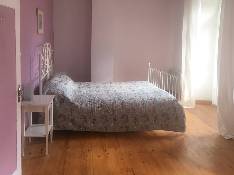 The stunning double aspect main bedroom