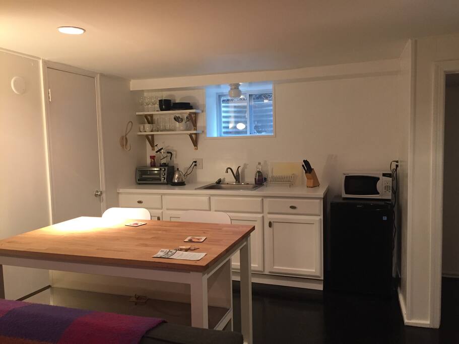 The kitchen and one of two workspaces (or the scene of your quiet dinner)