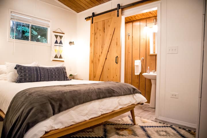 All-new furniture and mountain modern taste style this renovated cabin. Our guests rave about their incredibly comfortable sleep on our Tuft & Needle mattress and Burrow bed, and the personal touches like our library & slippers. 