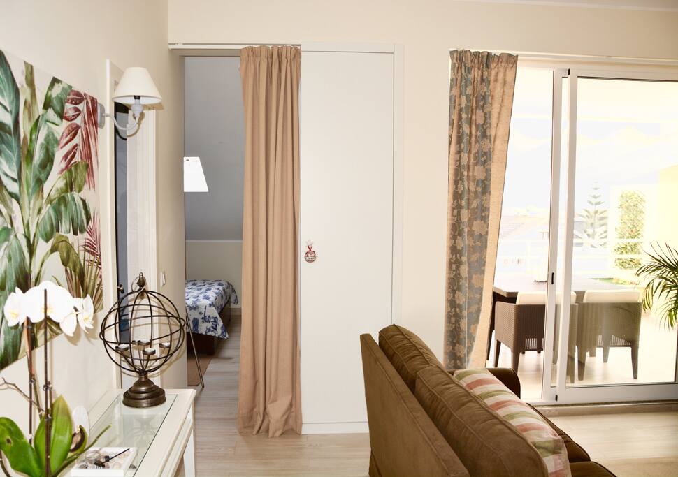 View of living room for bedroom and balcony