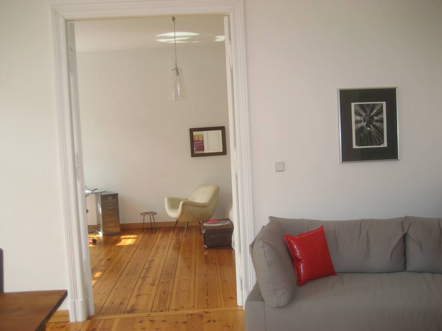 huge living room with extra bed for one person