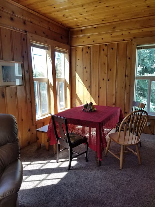 A view of the sunny dining area from the living room area