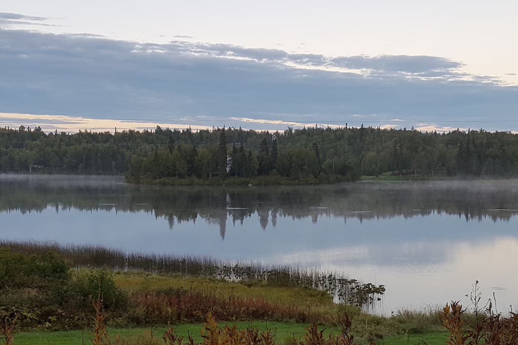 Summer mists rising on the lake.