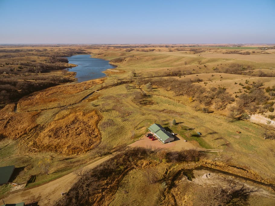 Arial photo of the lodge and beautiful land surrounding it.