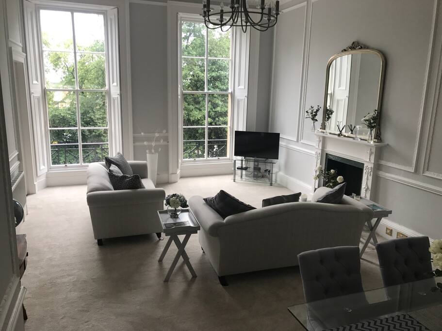 Large living room with dining table