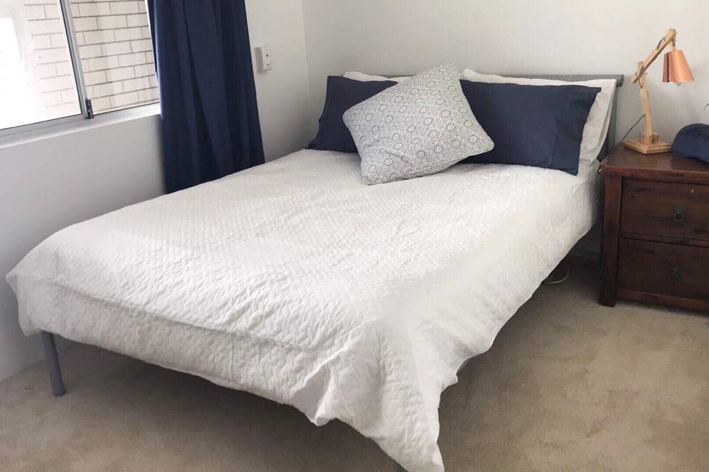 Cozy double bed for two.