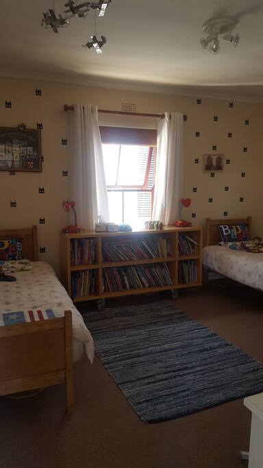 Kids room with 2 single bed. beds can be moved together.
