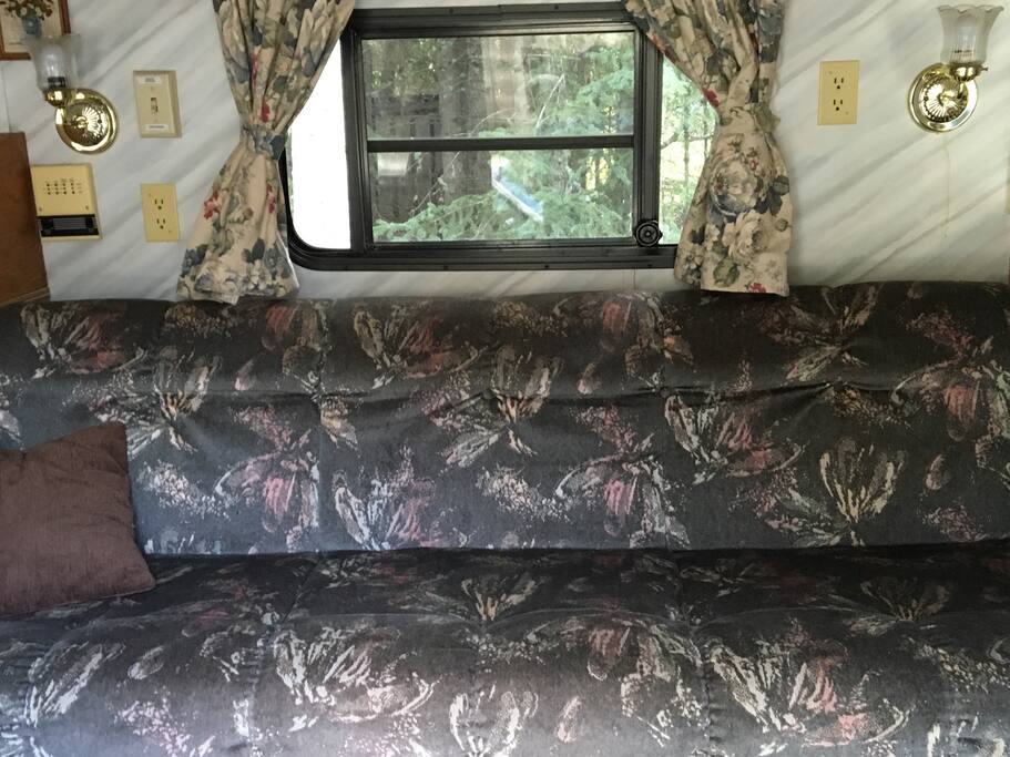 Couch converts into a bed.