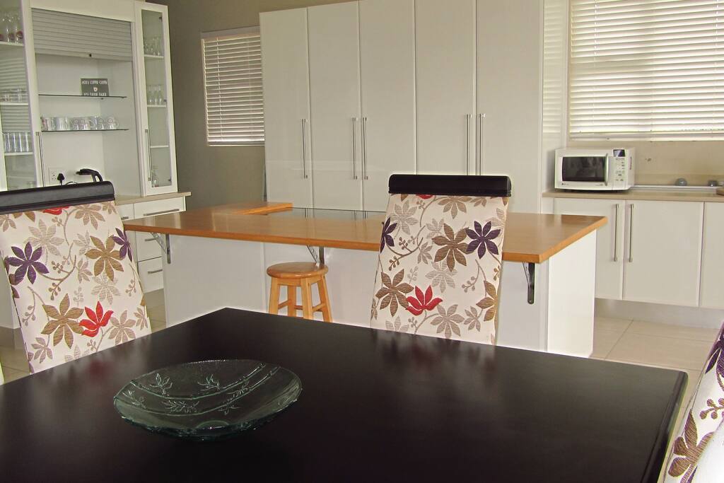 Open plan kitchen, lounge, dining room and indoor BBQ